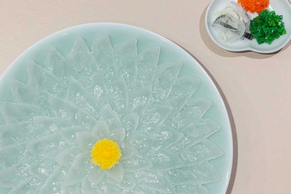 Food replica of Fugu-sashi (pufferfish sashimi) and seasonings