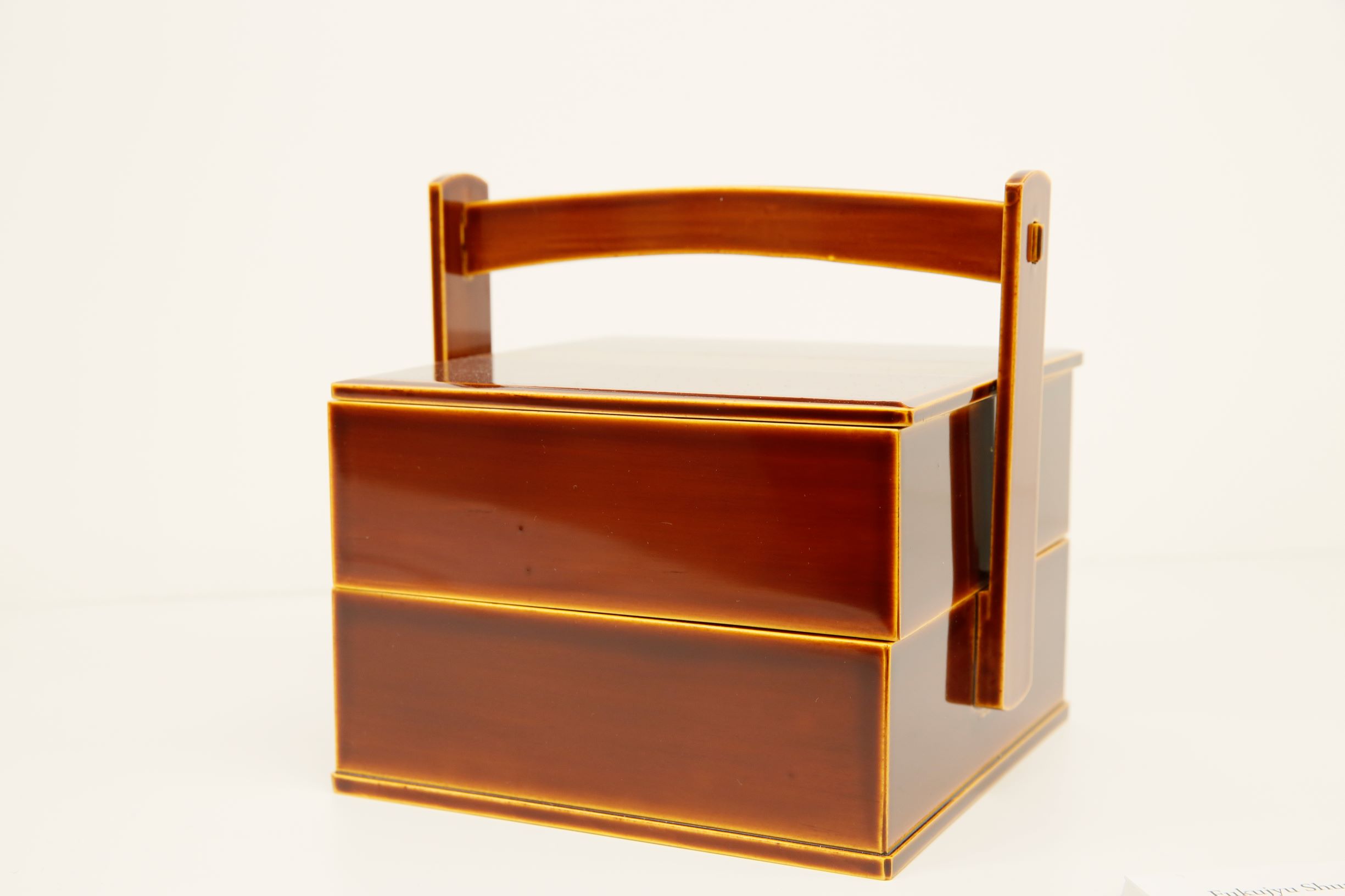 Traditional two-tiered handled box