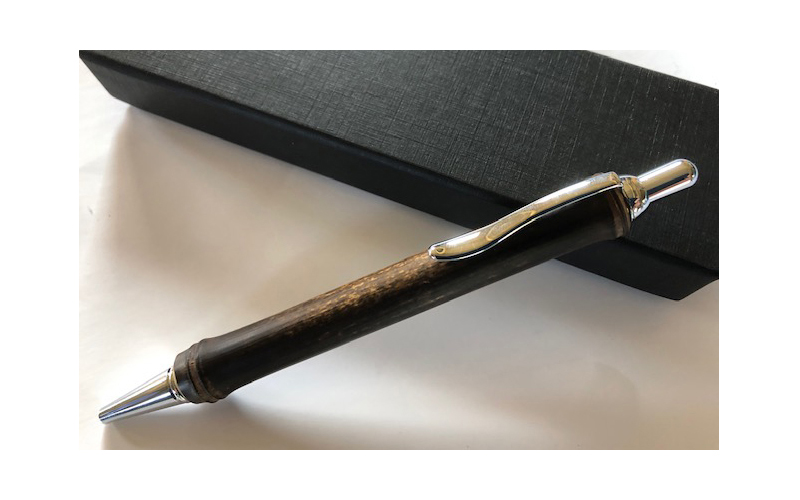 Ballpoint pen made of black bamboo and a pen case