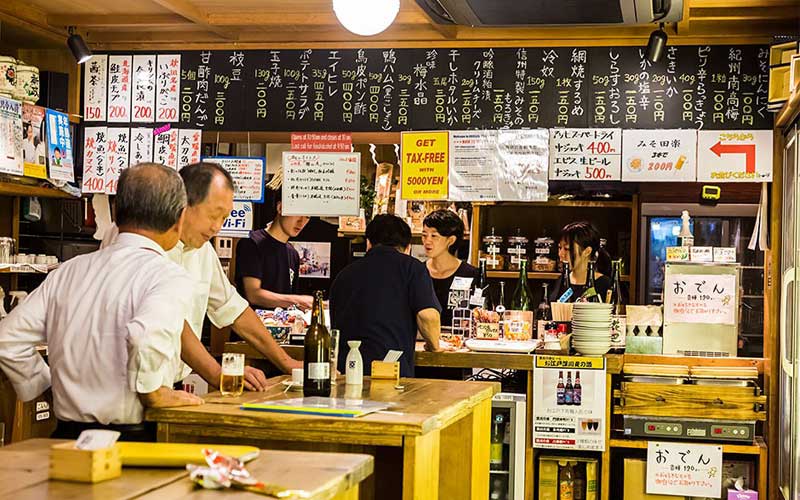 People inside a Japanese sake store