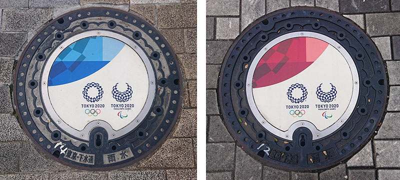 Olympic-themed manhole covers, blue and red