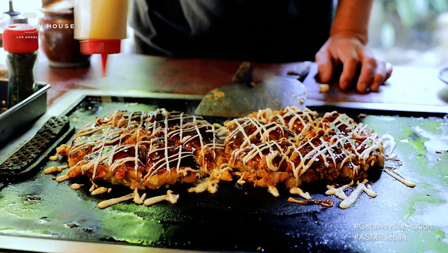 Okonomiyaki, the perfect summer street food being prepared