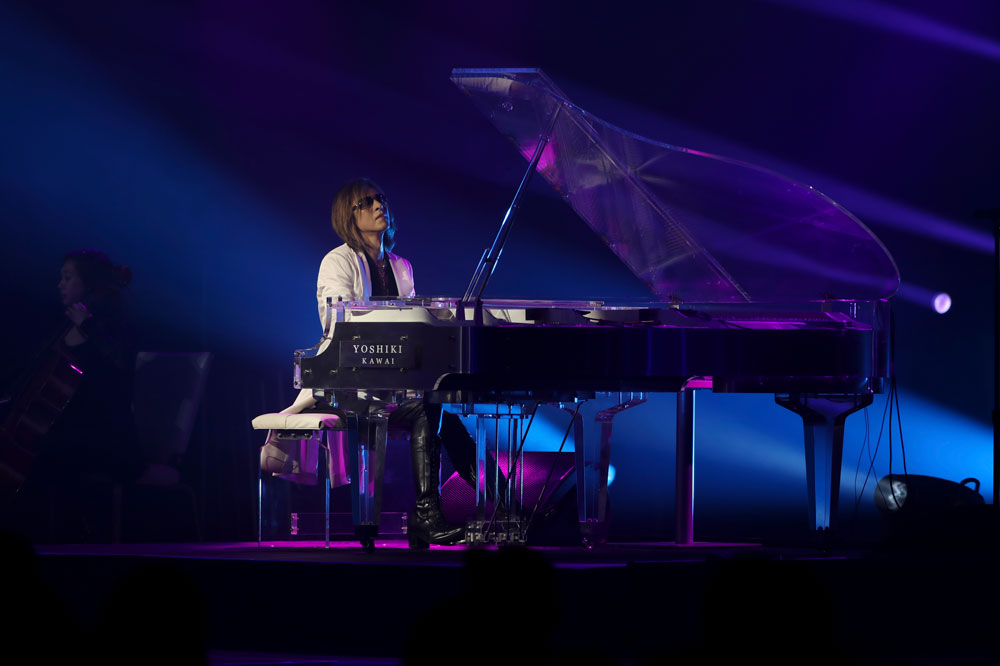 YOSHIKI performing the piano