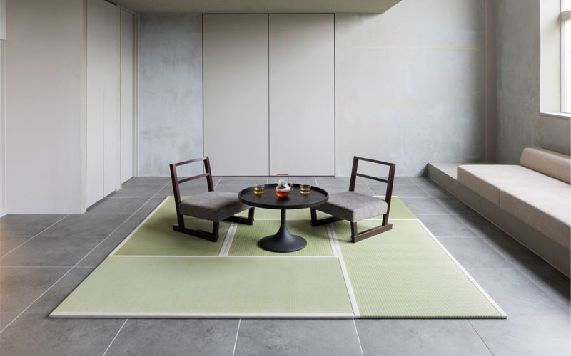 A room with Oki Tatami placed on the floor and with furniture