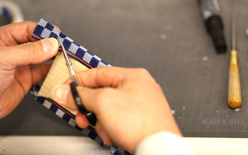 A tatami coaster being created by hand