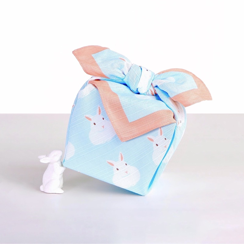 Furoshiki decorated with rabbit wrapped around with bento box