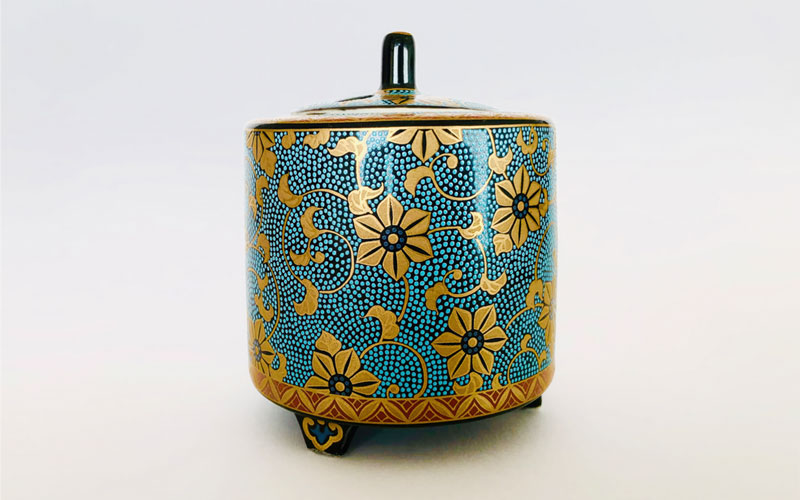 An inscent container with kutani-yaki