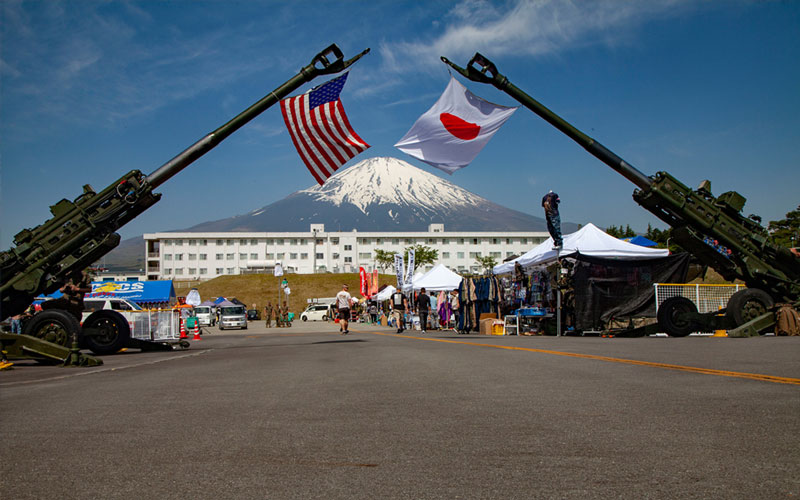 U.S. and Japan flags, with Mount. Fuji in the background