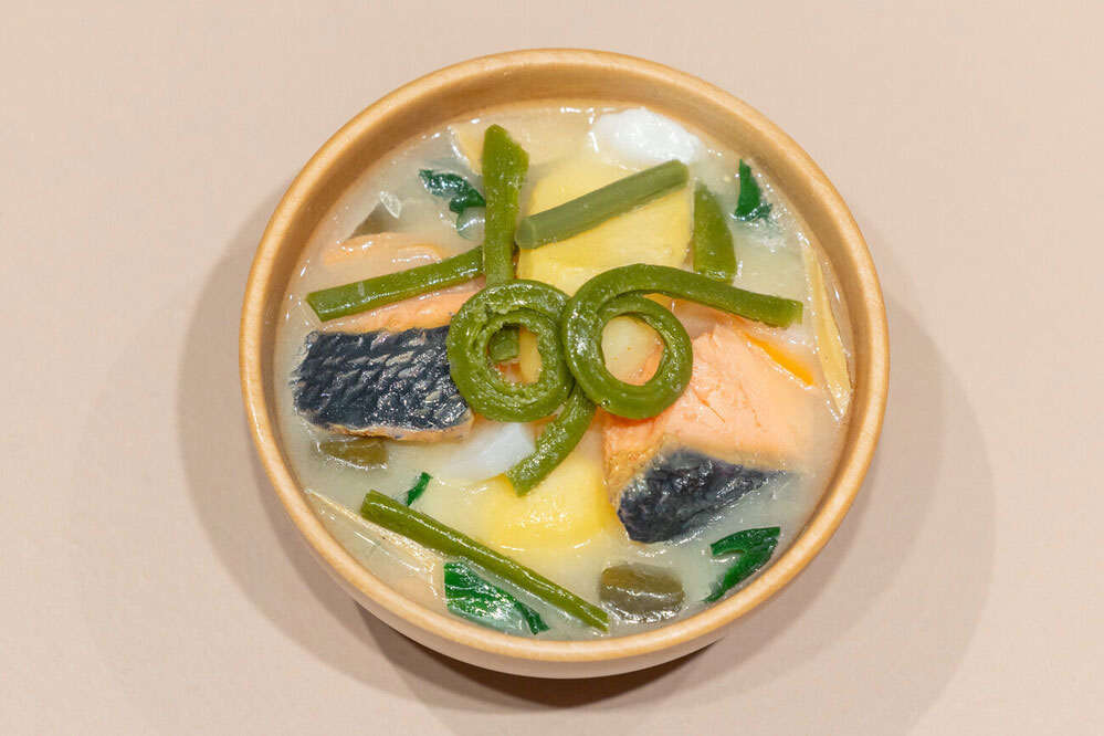 A food replica of ohaw soup in a bowl